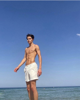 //iprorwxhjpqklq5p.ldycdn.com/cloud/liBprKqklrSRjlloolokkq/How-To-Style-Off-White-Swimwear-for-Men-in-Summer.jpg