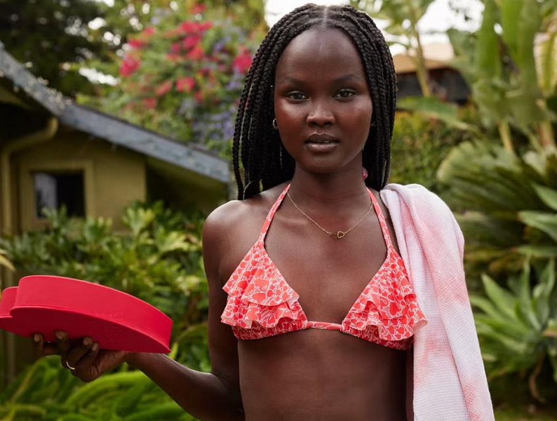 a women in the worlds smallest bikini